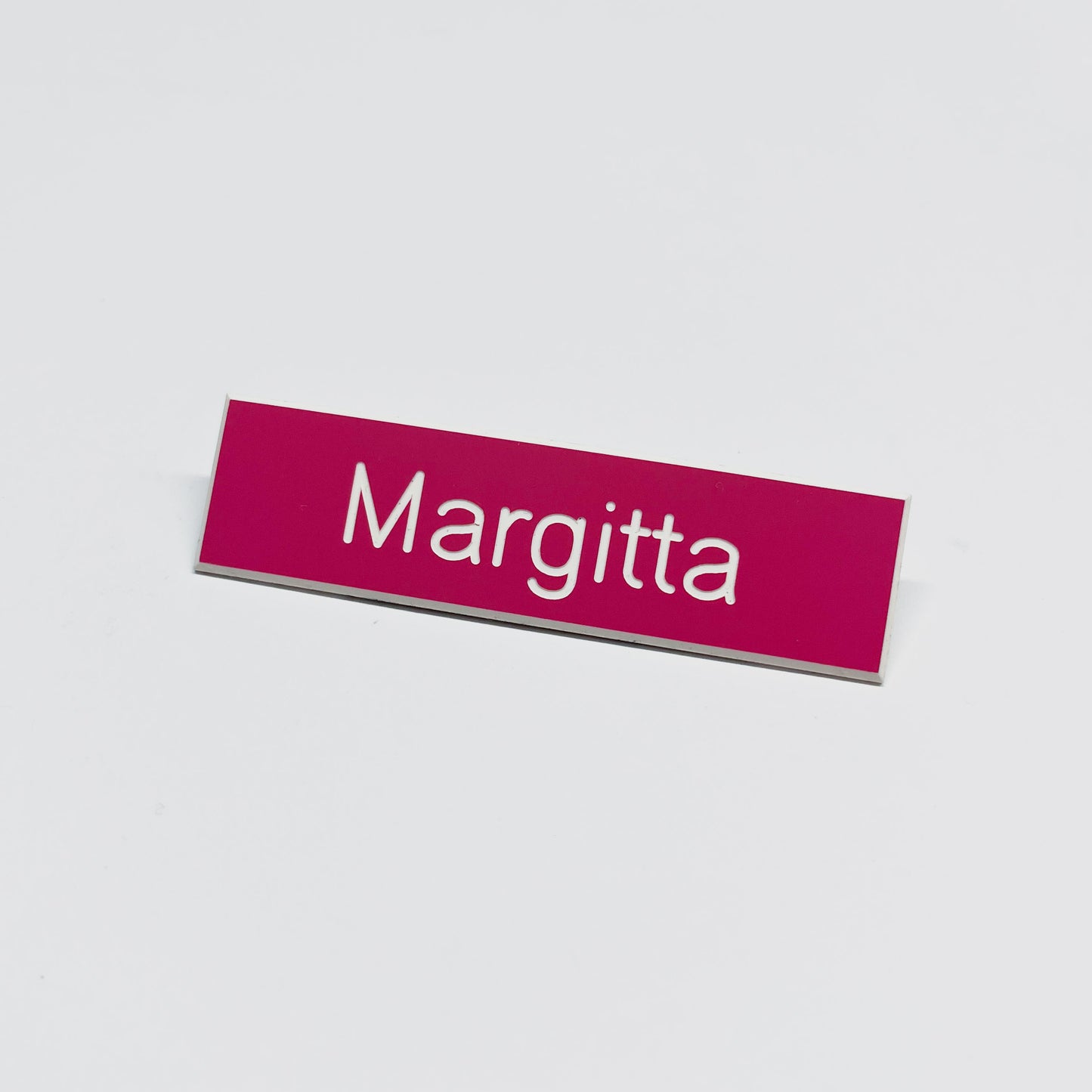 Julia Scher: Guard Name Tag, 2018