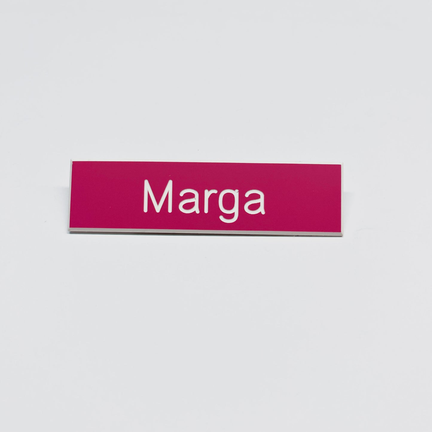 Julia Scher: Guard Name Tag, 2018