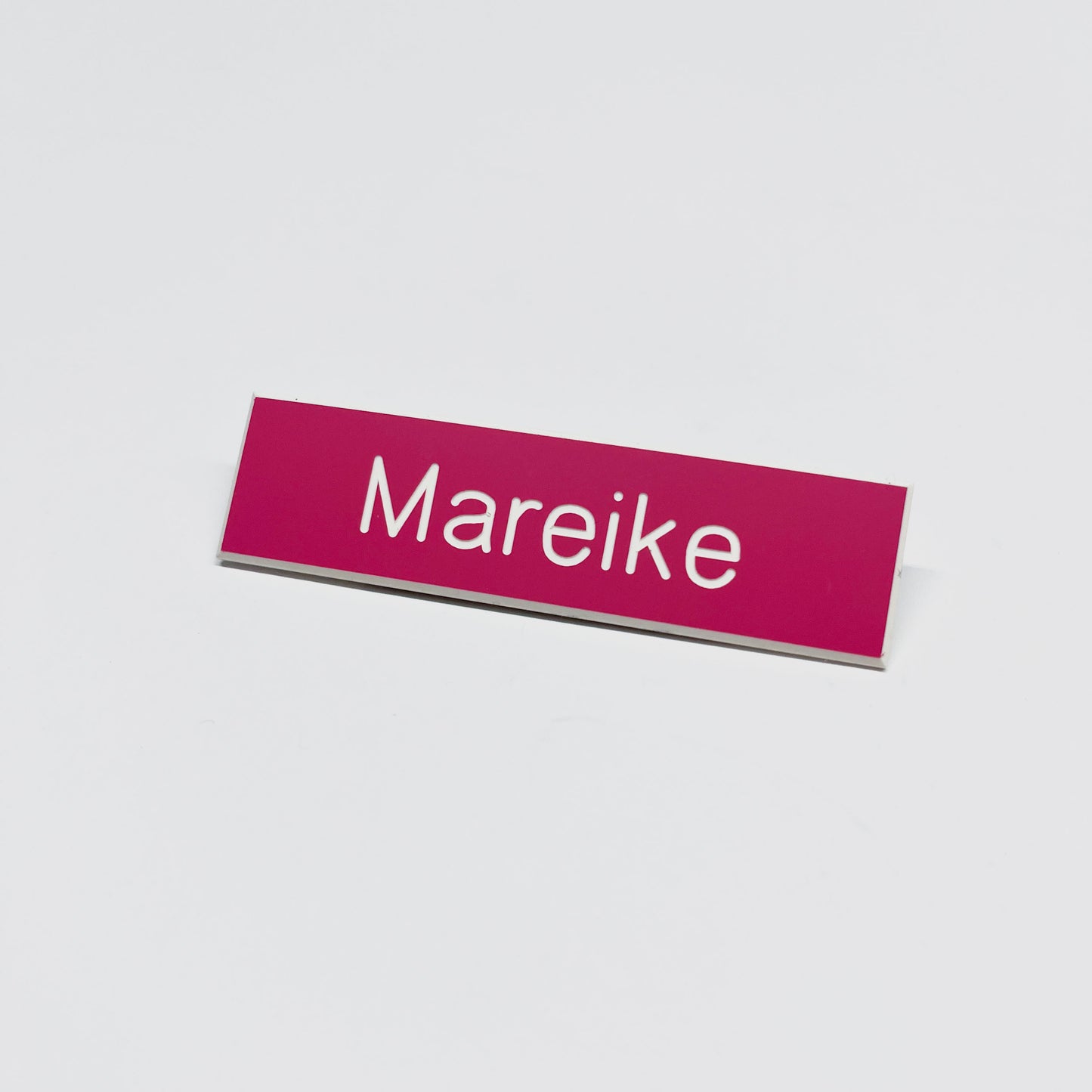 Julia Scher: Guard Name Tag, 2018