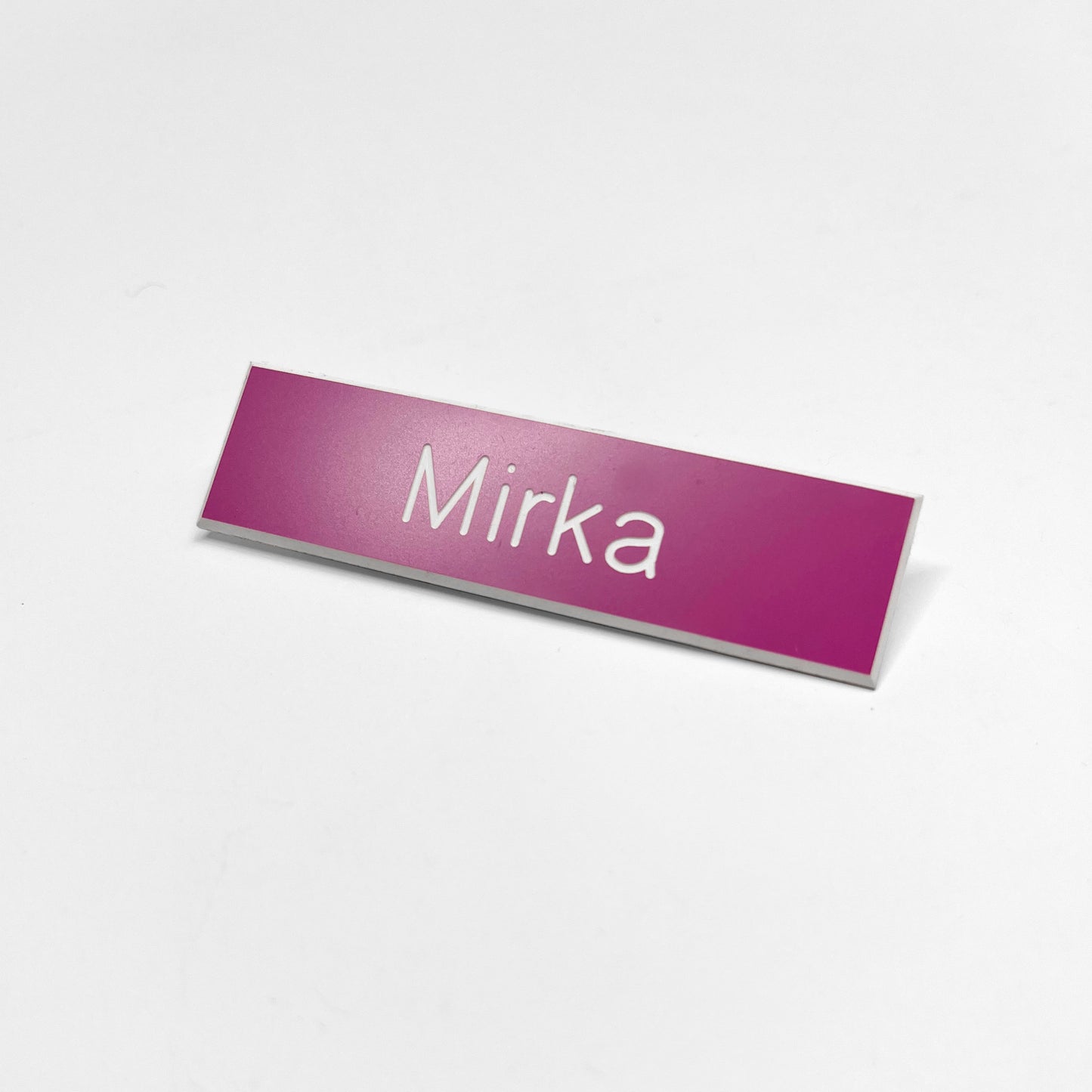 Julia Scher: Guard Name Tag, 2018
