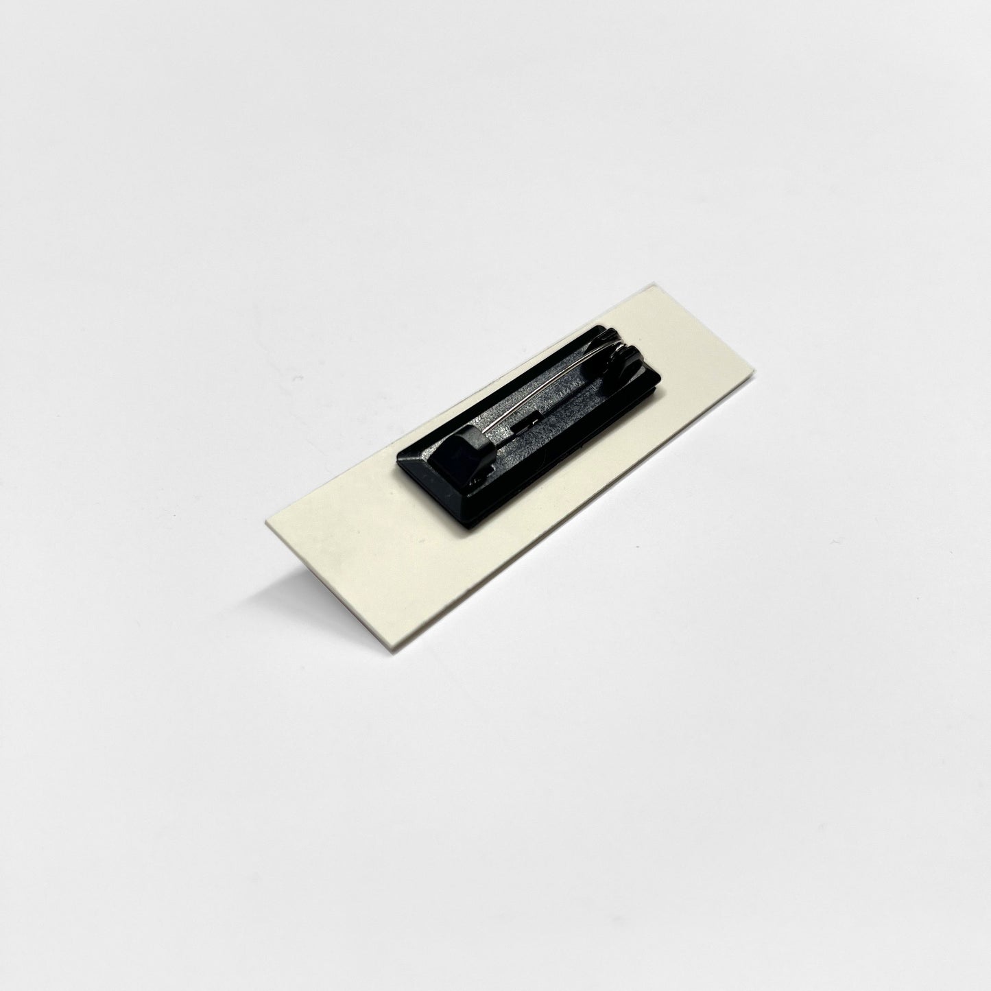 Julia Scher: Guard Name Tag, 2018